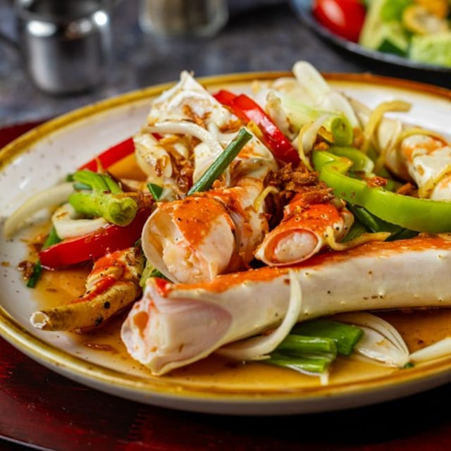 King Crab Legs with Scallion and Ginger.